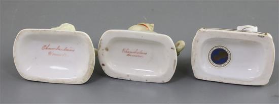 Three Chamberlains Worcester porcelain figures comprising two pugs and a poodle, c.1820-40, H. 6.7cm - 7cm